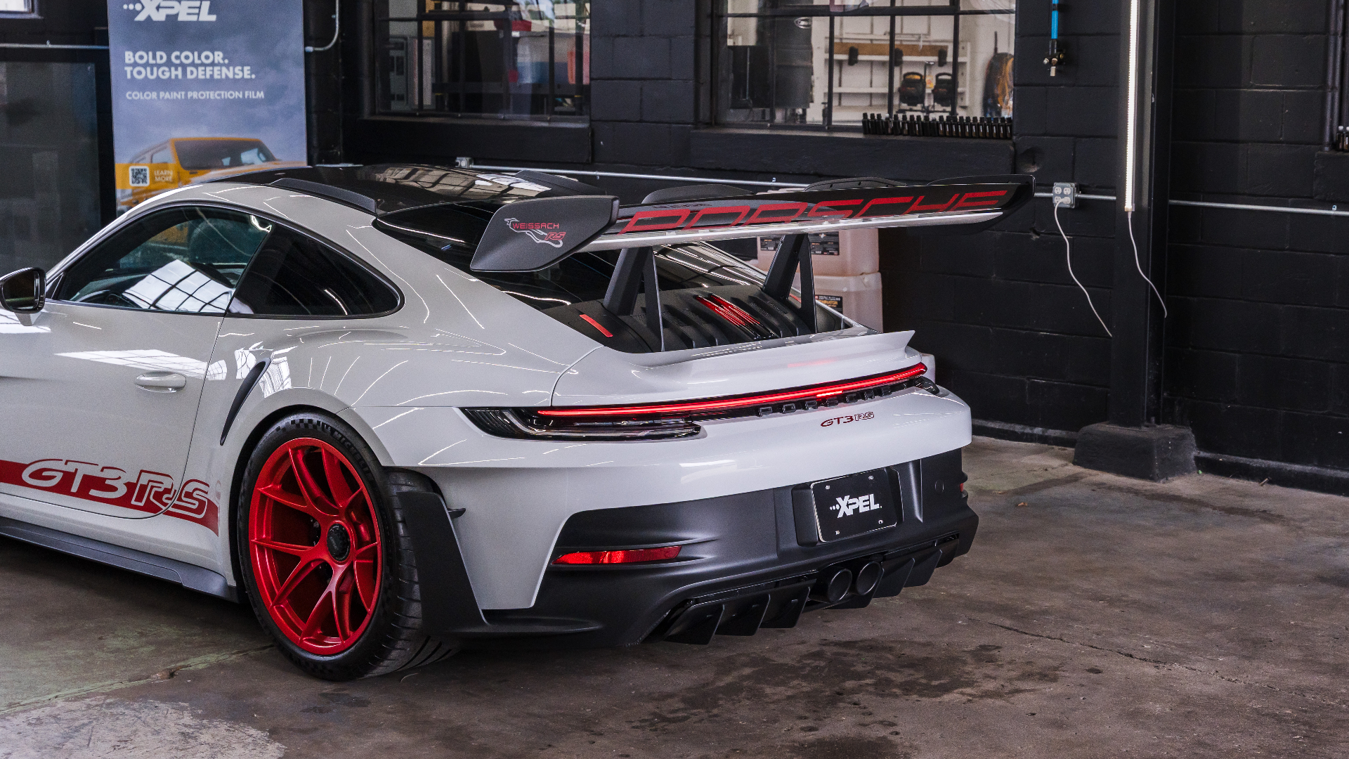 Porsche 911 GT3 RS rear wing wrapped with XPEL paint protection film